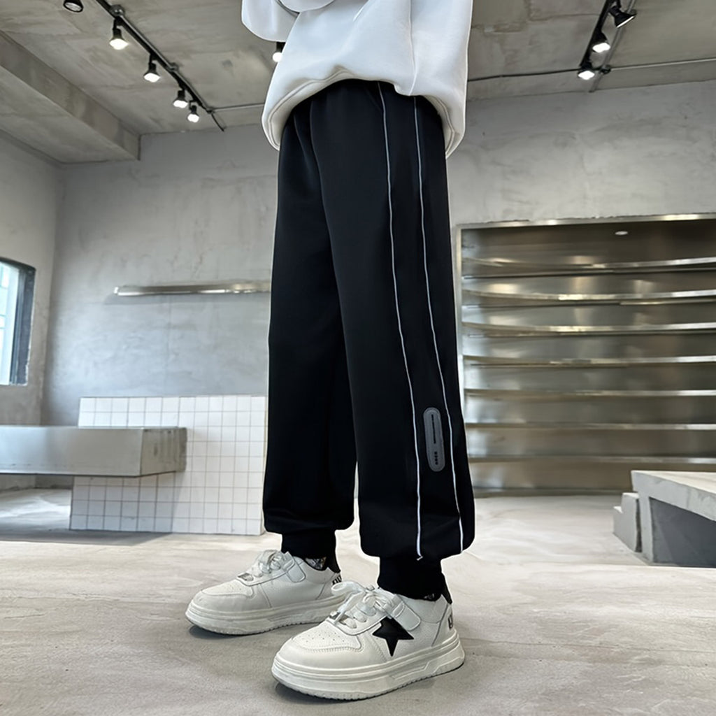 Boys Black Solid Elasticated Joggers Trackpants & Joggers Black 5-6 Y